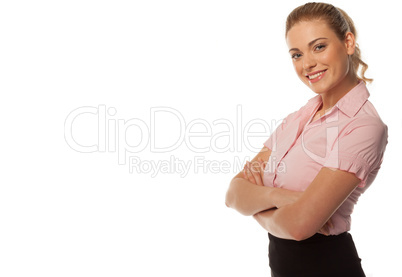 Smiling business woman with arms folded