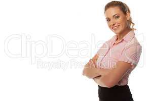 Smiling business woman with arms folded