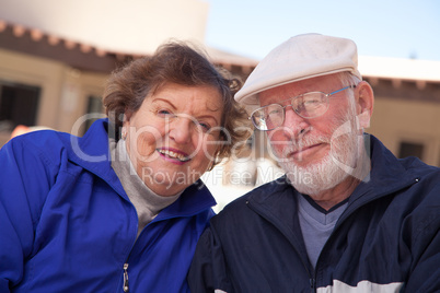 Happy Senior Adult Couple Bundled Up Outdoors