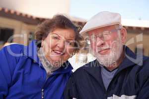 Happy Senior Adult Couple Bundled Up Outdoors