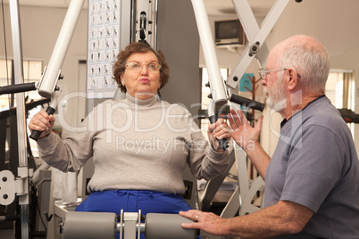 Senior Adult Couple Working Out Together in the Gym