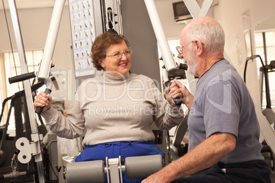 Senior Adult Couple Working Out Together in the Gym