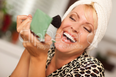 Blonde Woman Applying Her Makeup
