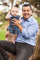 Handsome Hispanic Father and Son Posing for A Portrait