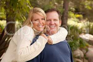 Happy Attractive Caucasian Couple in the Park