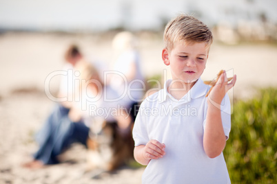 Cute Little Blonde Boy Holding His Starfish