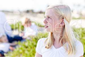 Adorable Little Blonde Girl Having Fun At the Beach