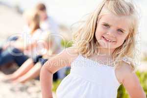 Adorable Little Blonde Girl Having Fun At the Beach