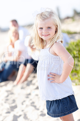 Adorable Little Blonde Girl Having Fun At the Beach