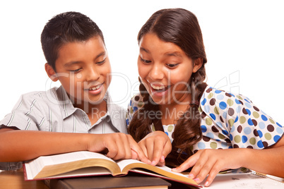 Hispanic Brother and Sister Having Fun Studying