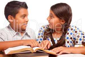 Hispanic Brother and Sister Having Fun Studying