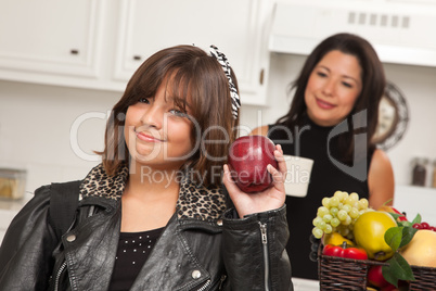 Pretty Hispanic Girl Ready for School with Mom