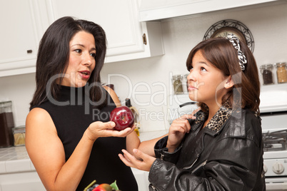 Pretty Hispanic Girl Ready for School with Mom