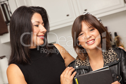 Pretty Hispanic Girl Ready for School with Mom