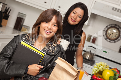 Pretty Hispanic Girl Ready for School with Mom