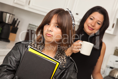 Pretty Hispanic Girl Ready for School with Mom