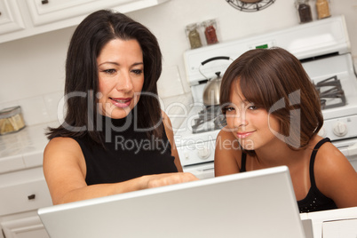 Hispanic Mother and Mixed Race Daughter on the Laptop