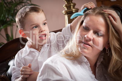 Cute Son Brushing His Mom's Hair