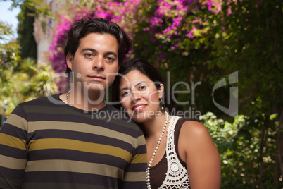 Happy Attractive Hispanic Couple At The Park