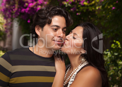 Happy Attractive Hispanic Couple At The Park