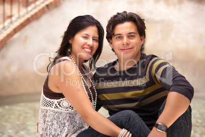 Happy Attractive Hispanic Couple At The Park