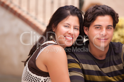 Happy Attractive Hispanic Couple At The Park