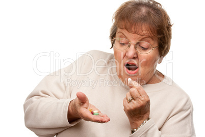 Attractive Senior Woman and Medication Pills.