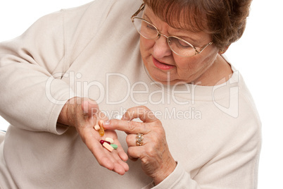 Attractive Senior Woman and Medication Pills.