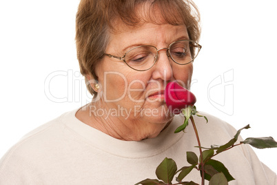 Attractive Senior Woman with Red Rose.