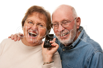 Happy Senior Couple Using Cell Phone on White