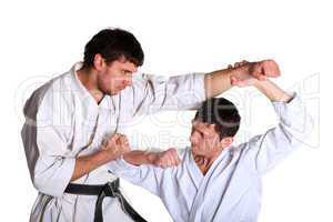 Karate. Men in a kimono with a white background