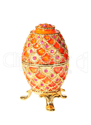 Metal egg with crystals on the white background (souvenir)