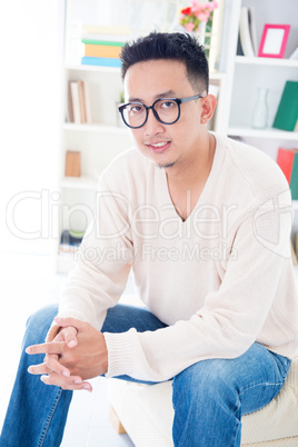 Southeast Asian male with spectacles