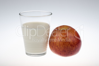 glass of milk and an apple
