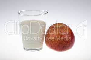 glass of milk and an apple