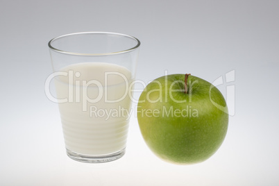 glass of milk and an apple