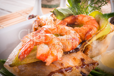 shrimps with fish and vegetables