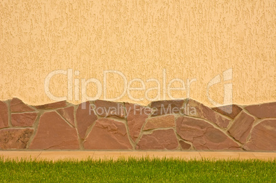 A wall with a stone border