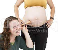 midwife listening at human belly