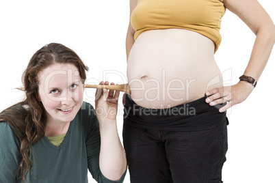 midwife listening at human belly