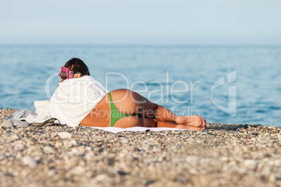 Beauty slim woman on sea beach