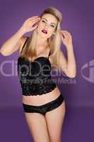 Stunning blonde modeling sexy black lingerie