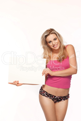 Woman in lingerie with a blank board