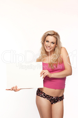 Woman in lingerie with a blank board