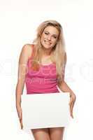 Woman in lingerie with a blank board