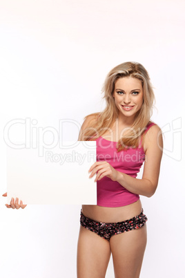 Woman in lingerie with a blank board