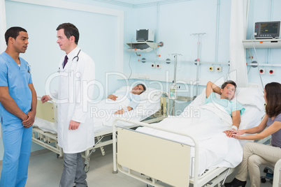 Doctor and male nurse in a hospital room