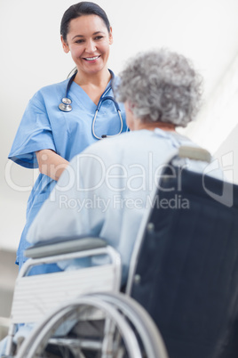 Nurse talking to a patient in a hospital