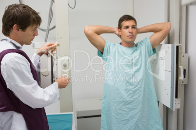 Male patient having a chest x-ray