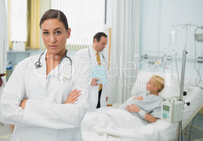 Female doctor folding her arms